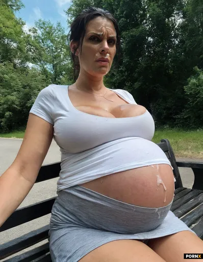 Pregnant woman with giant tits sitting on a Street bench