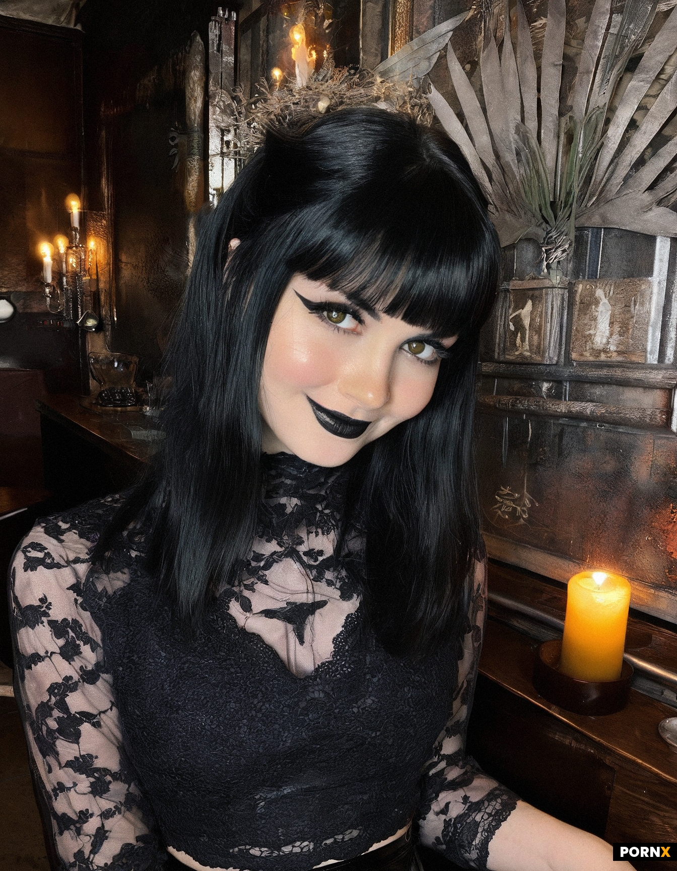 Gorgeous goth woman with jet-black hair and bangs