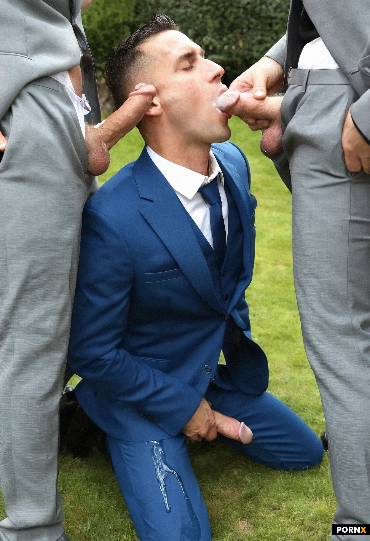 (Very slim:1.5 enthusiastic gay French groom guy, early 30s, clean shaven, very short fade dark brown hair, brown eyes, arched nose, swallowing cum, many cumshots smeared across his face, bright blue suit, kneeling in courtyard, holding and sucking multiple thick cummy cocks); (his face surrounded with four cocks out of grey suits masturbating and cumming):1.5. Sunny. Face Closeup