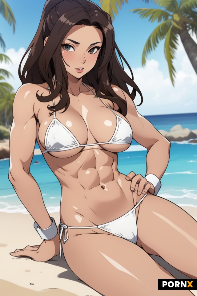 Sexy brunette woman sitting on a beach